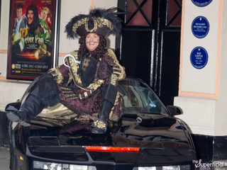 Illustration for article titled It's Friday, so here's a photo of David Hasselhoff sitting on KITT while dressed as a pirate